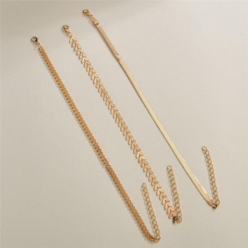 43522-er9qv2.jpg Simple chain anklet set for women styled on ankle with sandals