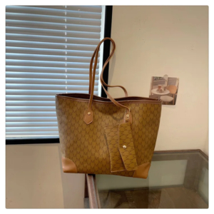Front view of a vintage monogram retro shoulder bag in faux leather