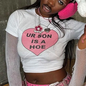 Woman wearing a stylish printed crop tee paired with relaxed high-waisted jeans