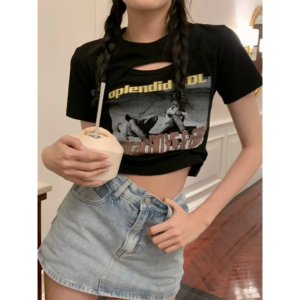 Woman wearing a Y2K style short sleeve hollow out crop top in a street style setting