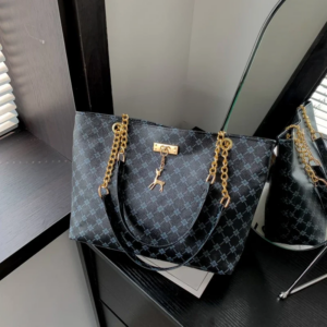Monogram print soft leather tote bag with hanging charm accessory