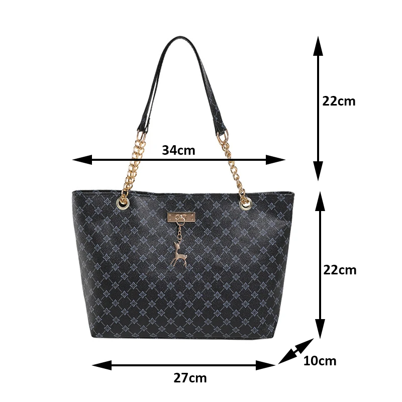 Monogram print soft leather tote bag with hanging charm accessory